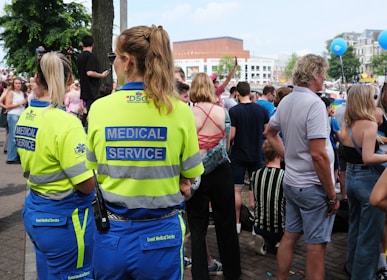 A group of people standing around each other