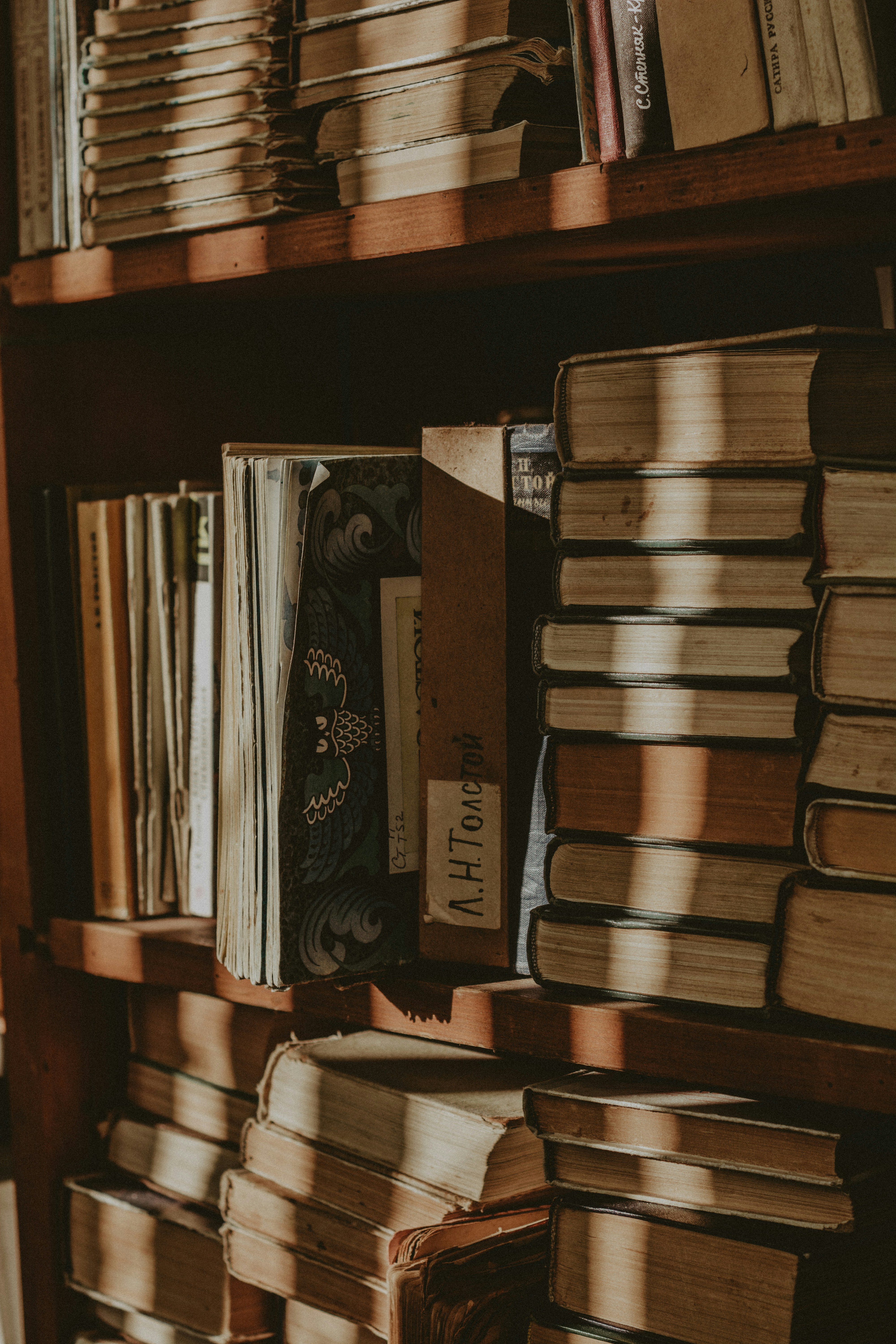A book shelf filled with lots of books