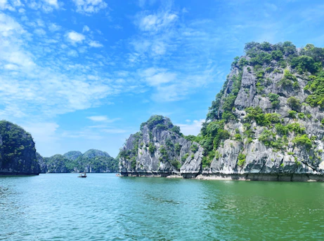A large body of water surrounded by mountains