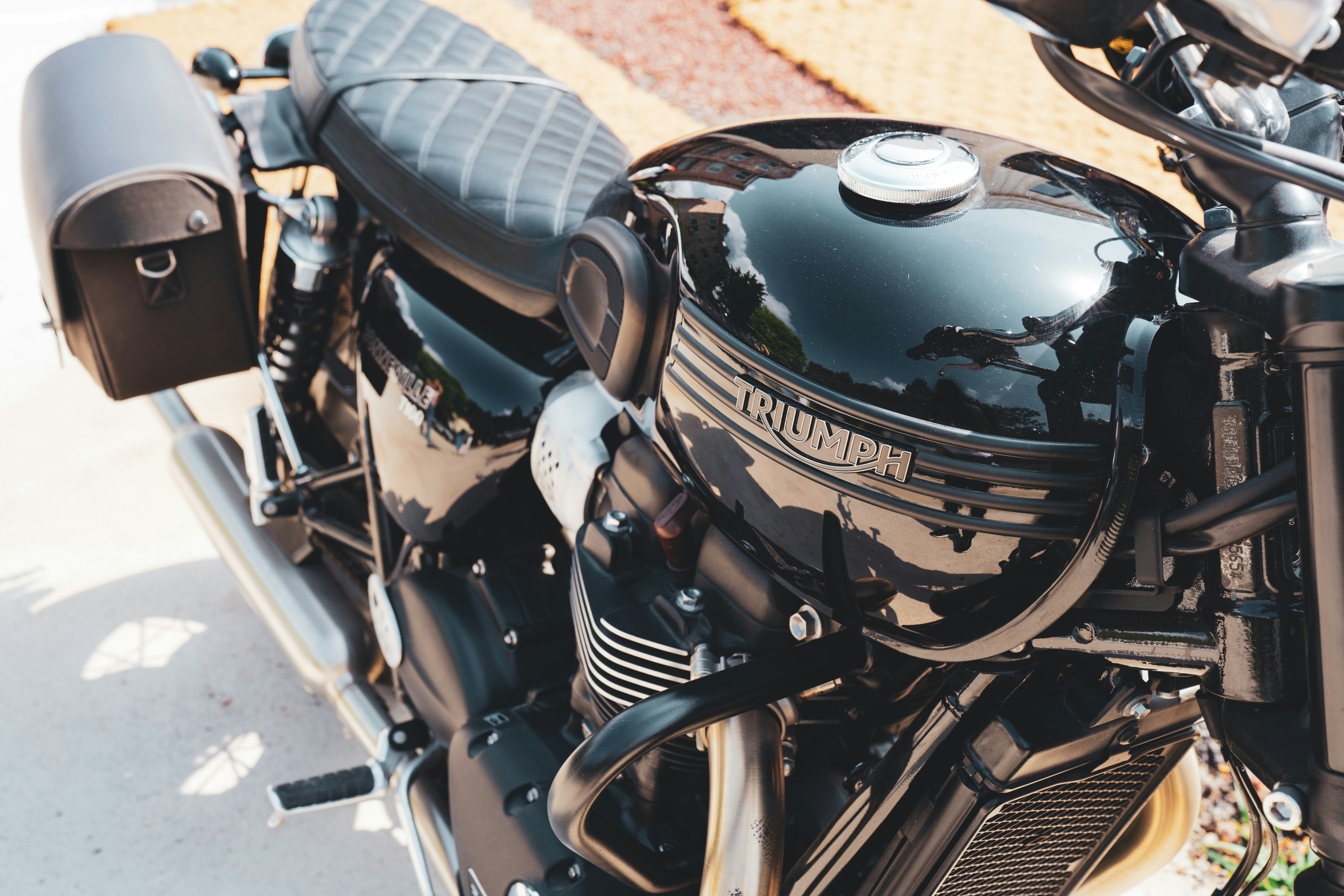 A black motorcycle parked on the side of the road