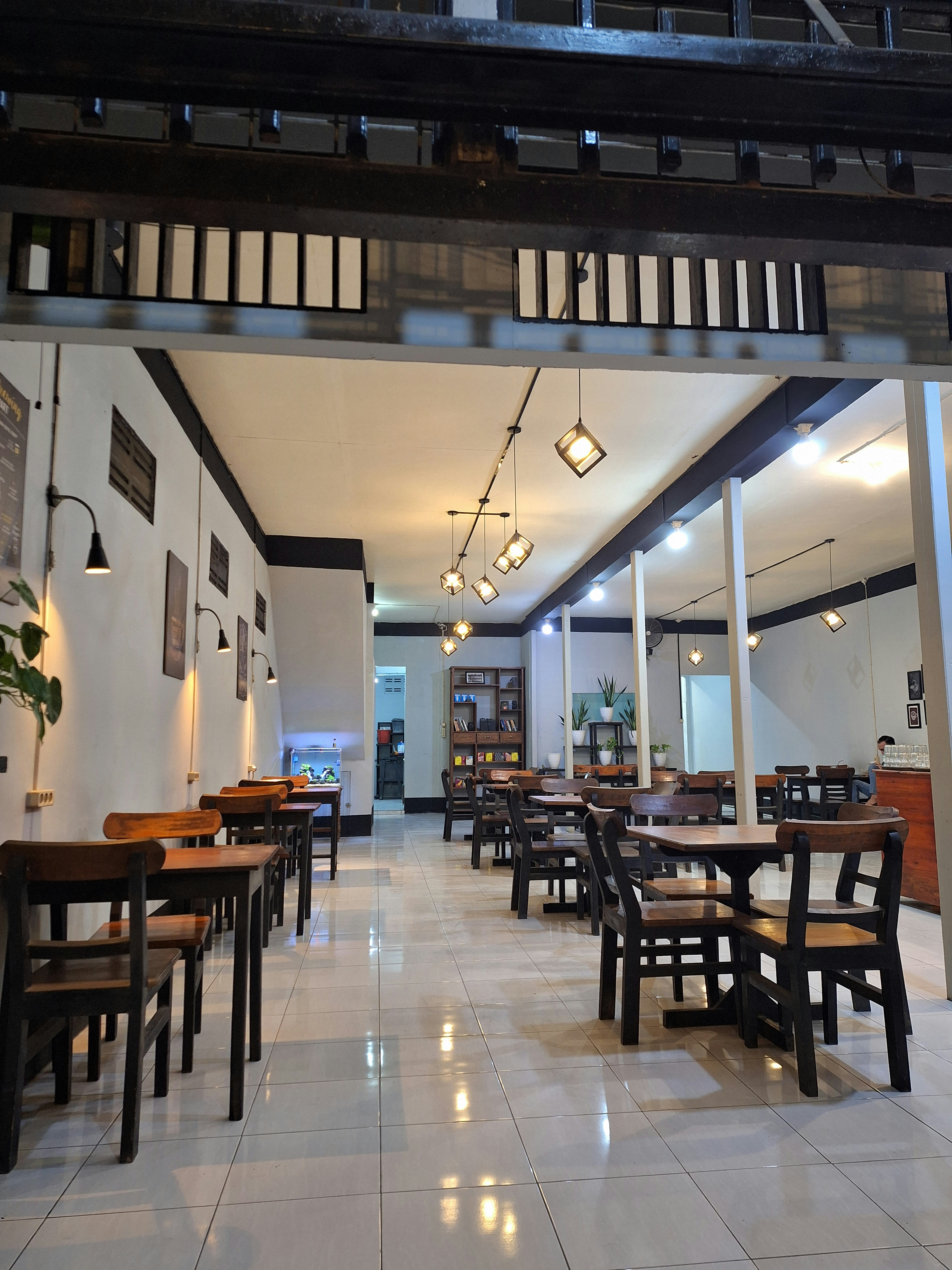 Futureproofing Small Cafés: Micro‑Docs, Local Discovery and Retention Tactics for 2026