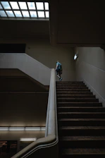 A person walking down a flight of stairs