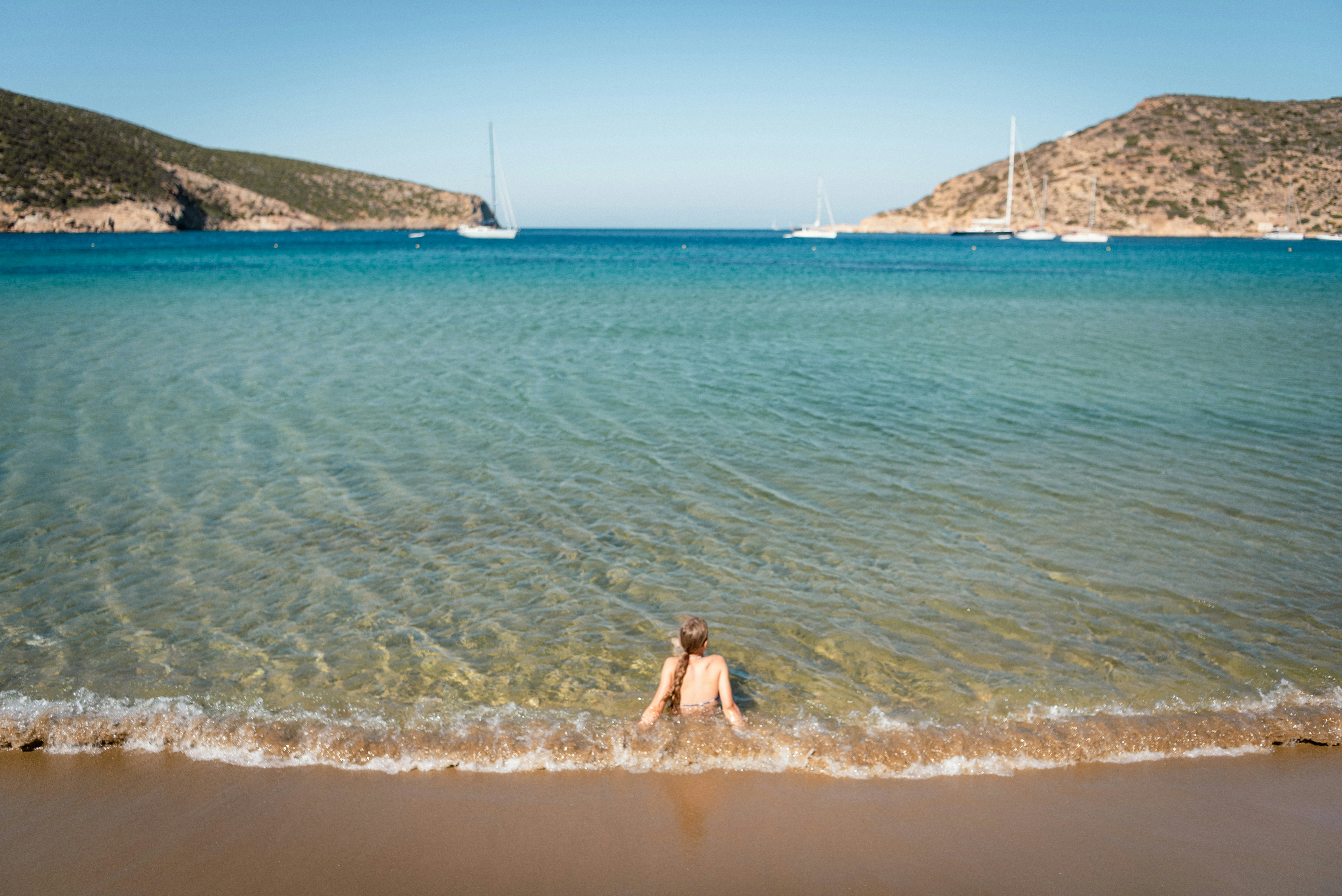 A person in the water at the beach