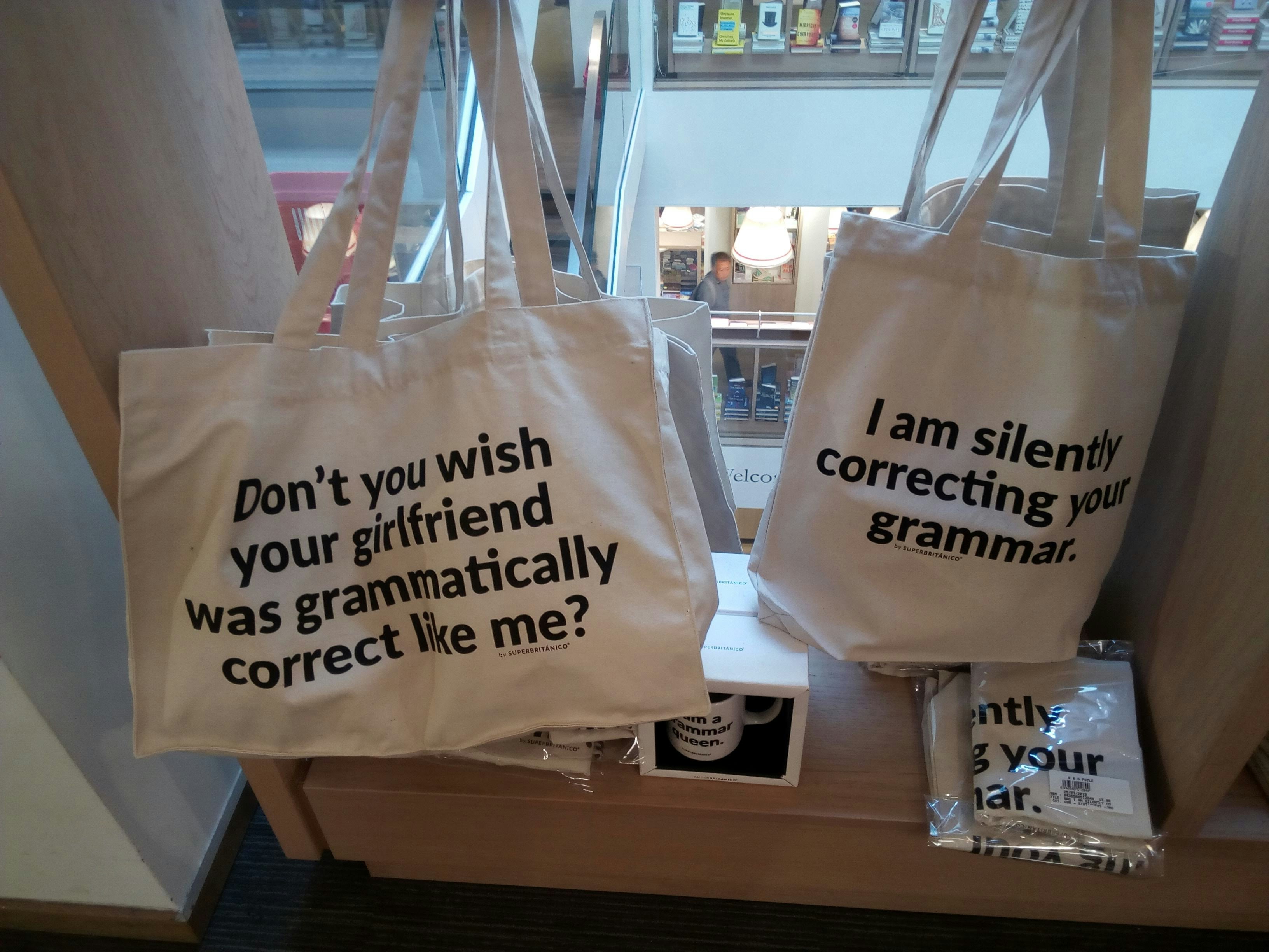 A couple of bags with some writing on them