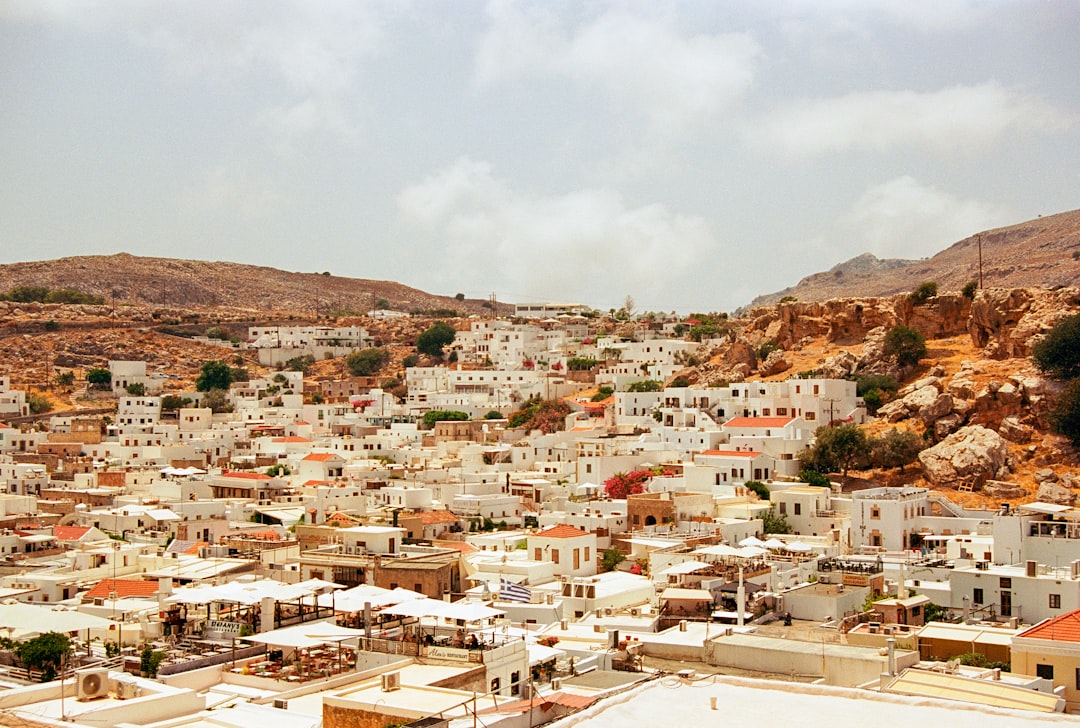 A view of a city from a hill,