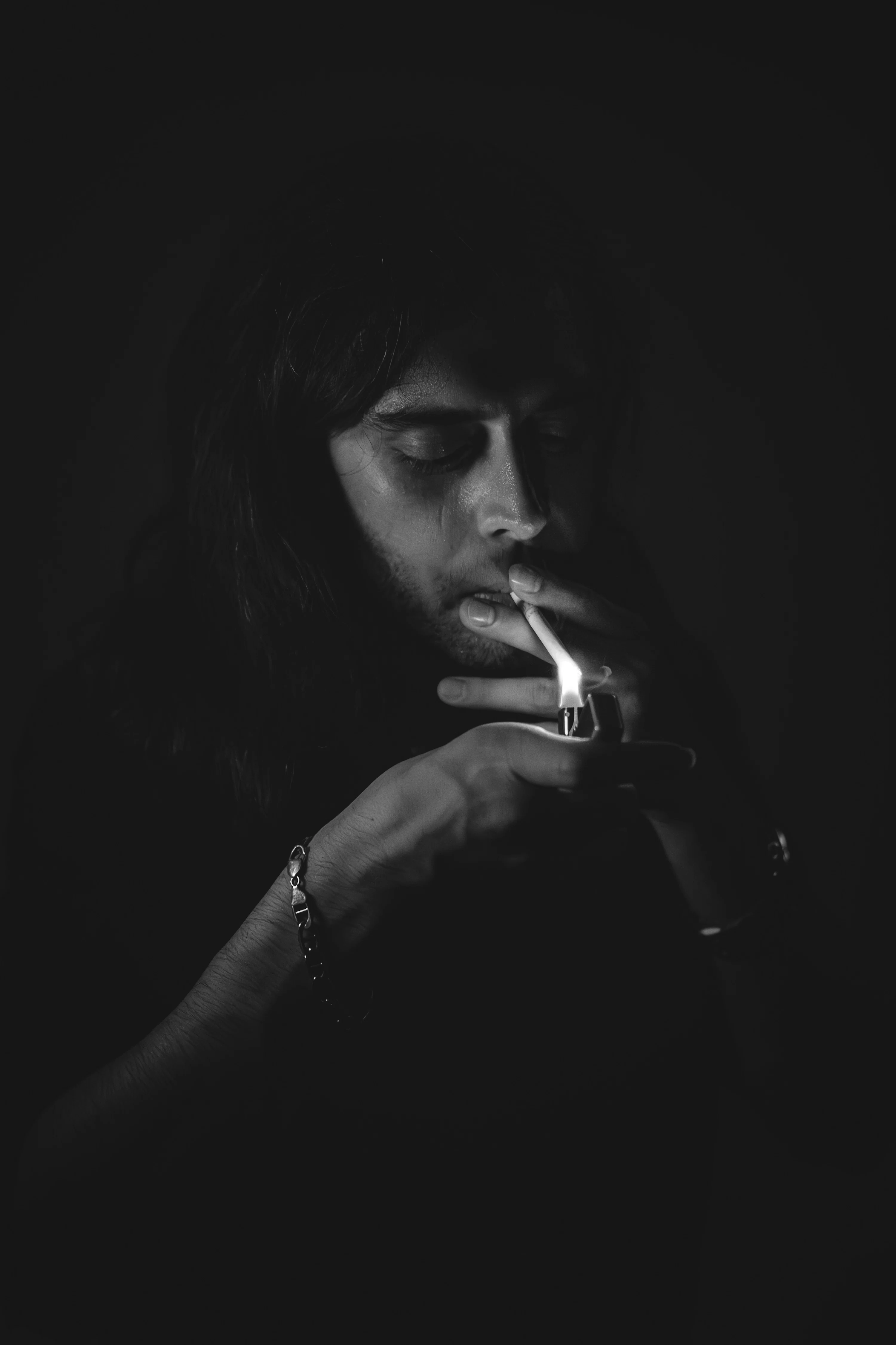smoking cigarette in dark A man a the photo Free Black Image on Unsplash A man smoking a cigarette