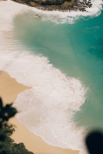 An aerial view of a beach and a body of water