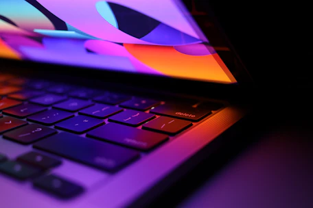 A close up of an apple laptop computer