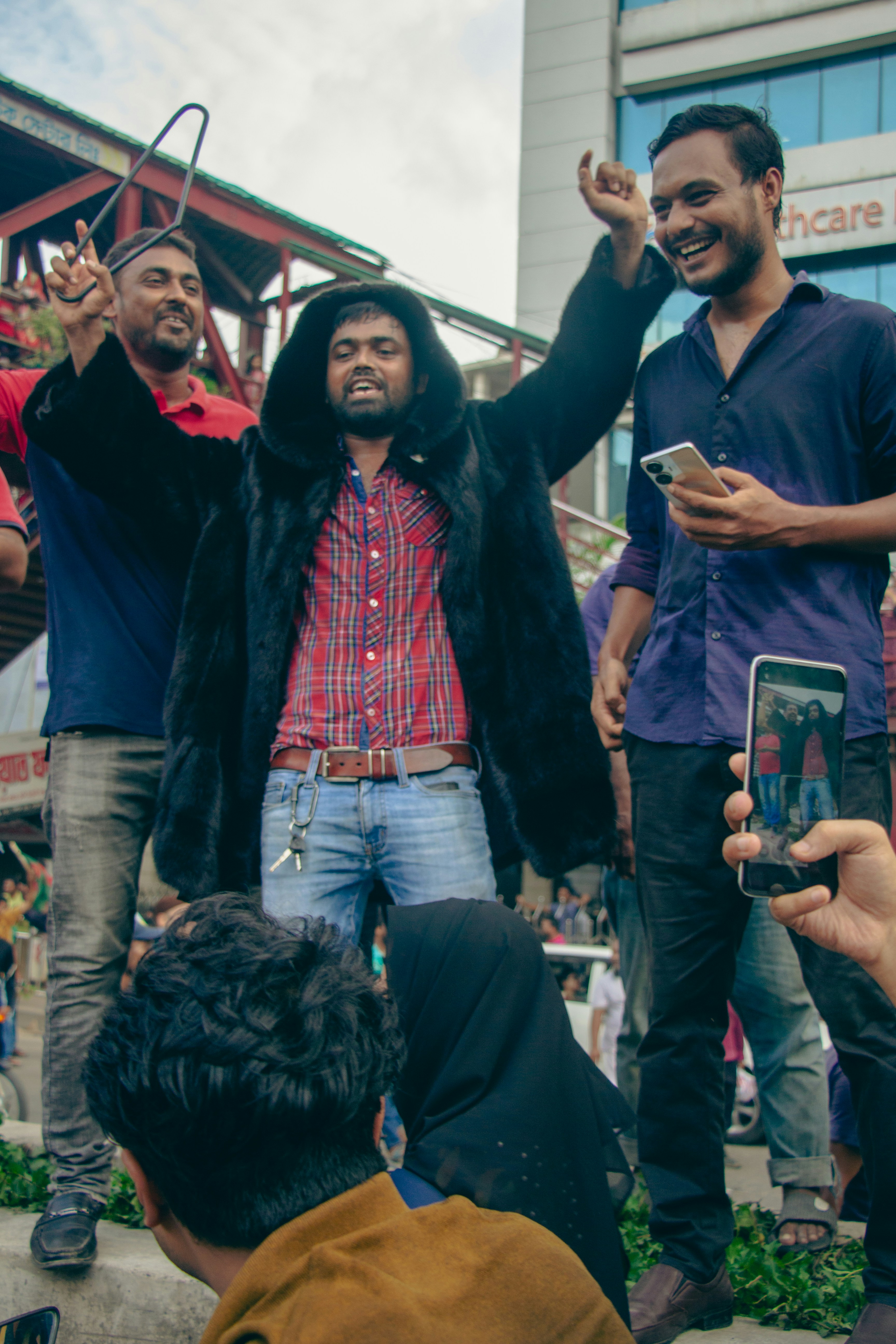 A group of men standing next to each other