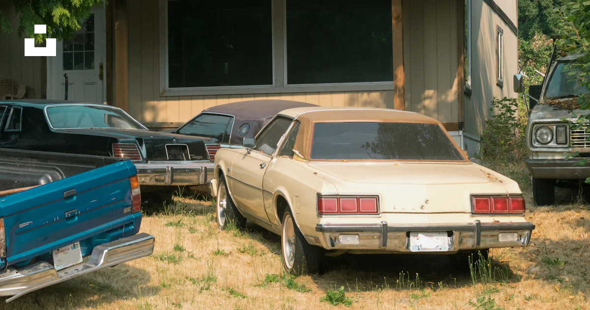 A couple of cars parked in front of a house photo – Free Tacoma Image ...