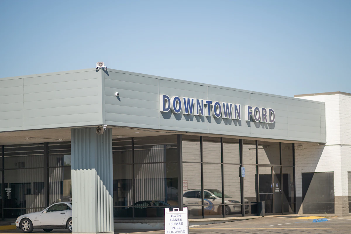 Cars parked outside an automobile dealership