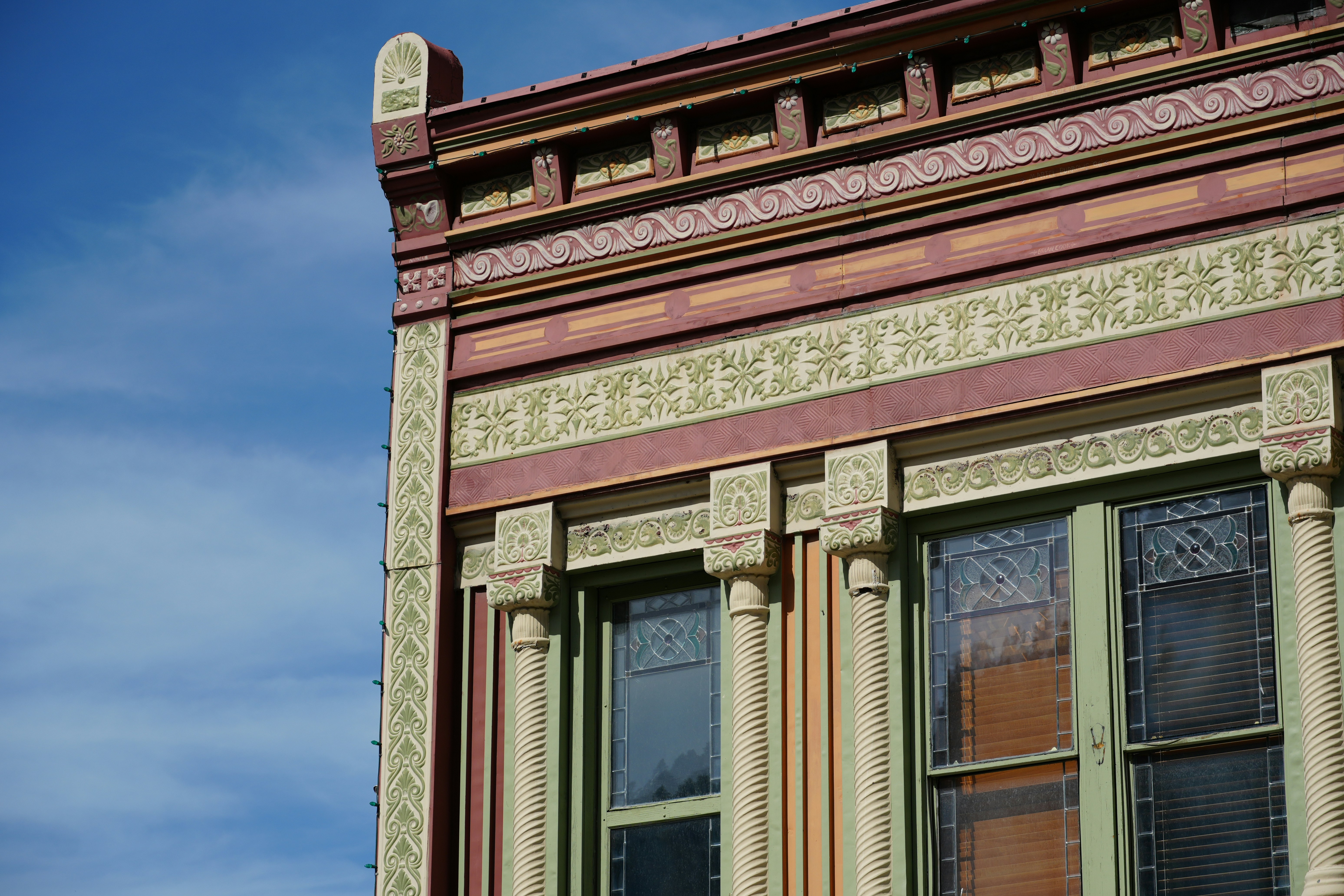 A tall building with a clock on the side of it