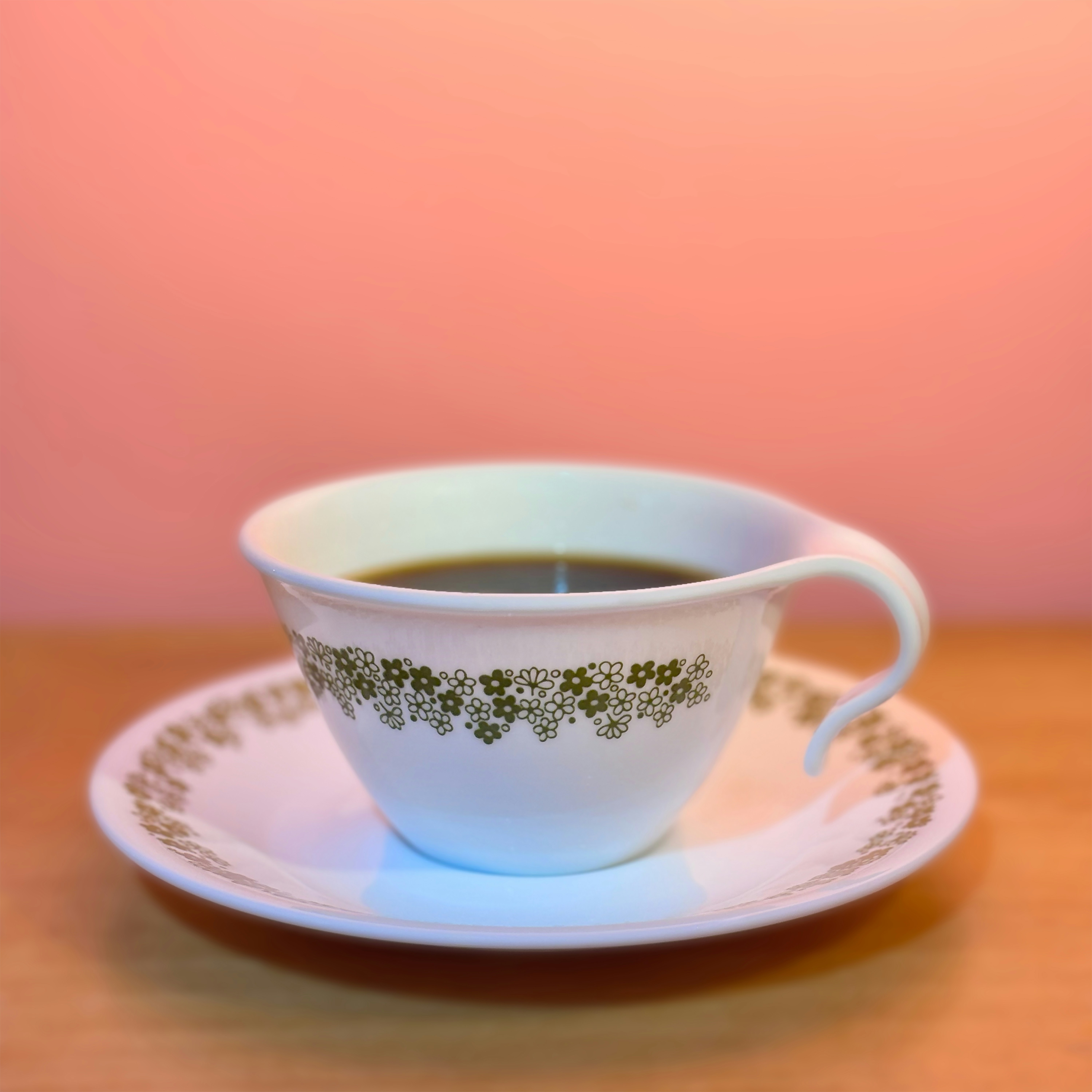 A cup of coffee sitting on top of a saucer