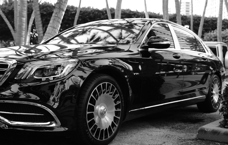 Black luxury sedan curbside
