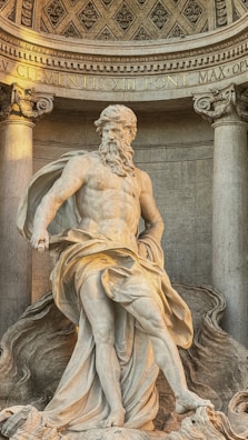 A statue of a man with a beard and a beard