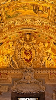 The ceiling of a building with a painting on it