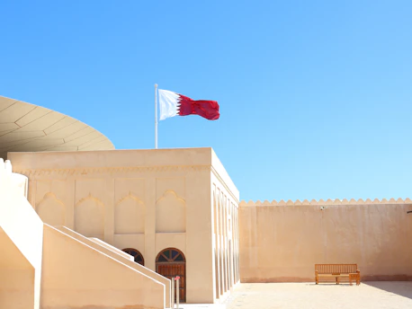 A building with a flag on top of it