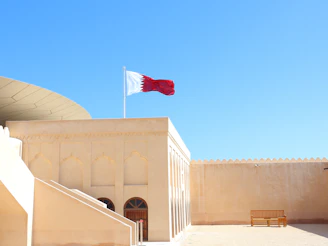 A building with a flag on top of it