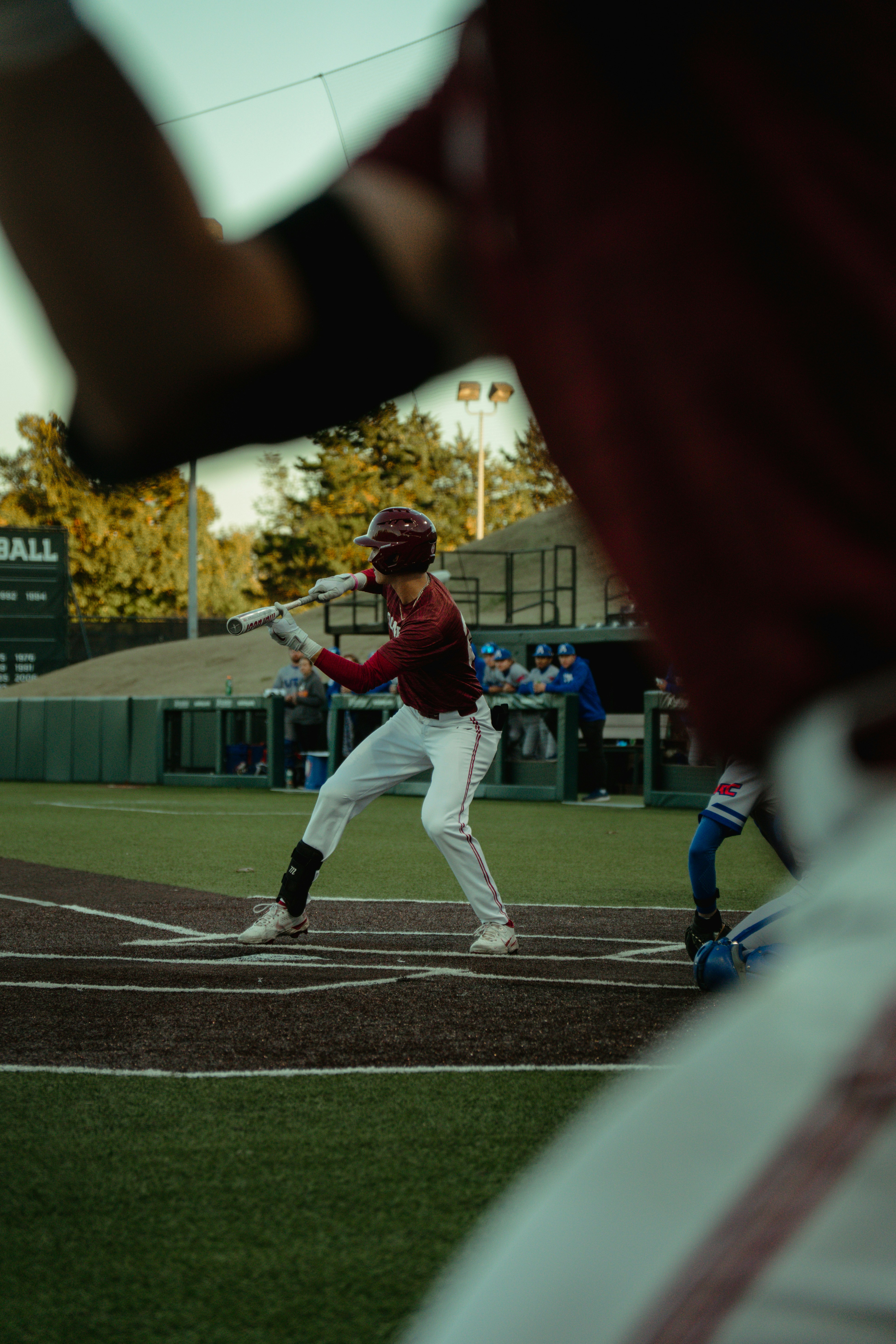 A baseball player swinging a bat on a field