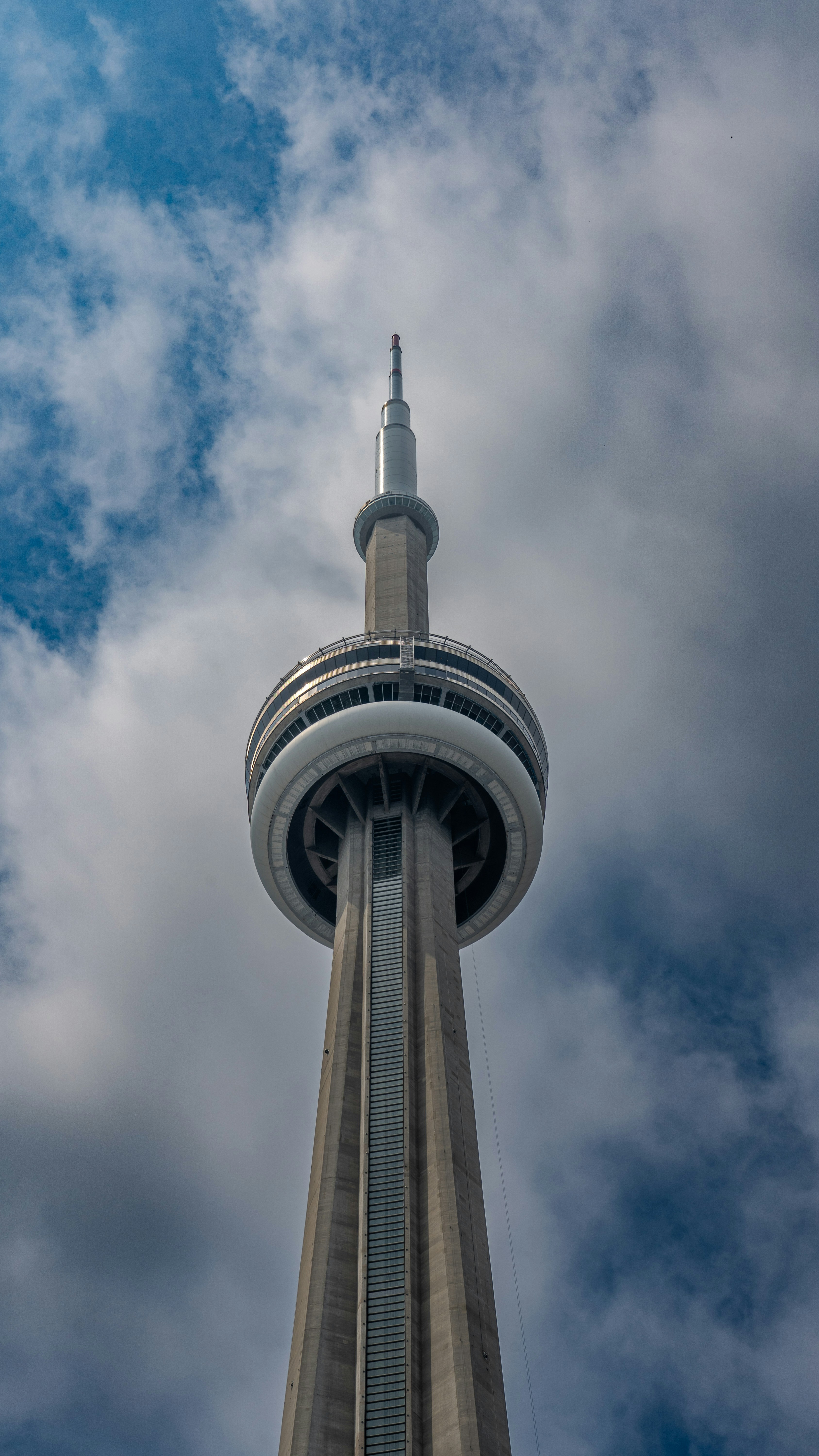 A tall tower with a sky background