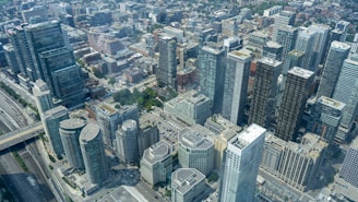 An aerial view of a city with tall buildings