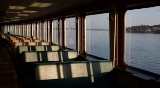 A long row of seats sitting on top of a boat