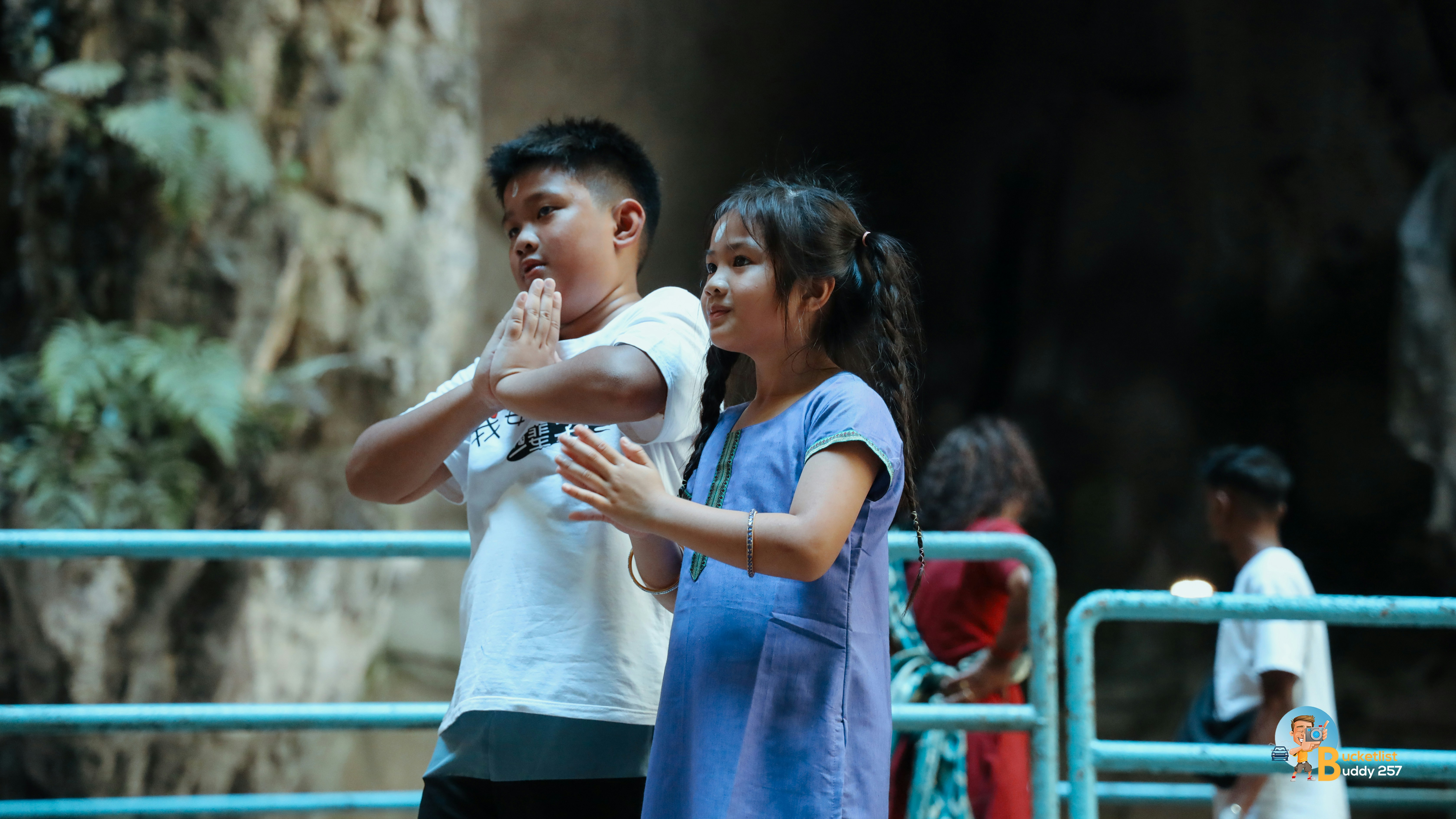 A man and a woman standing next to each other