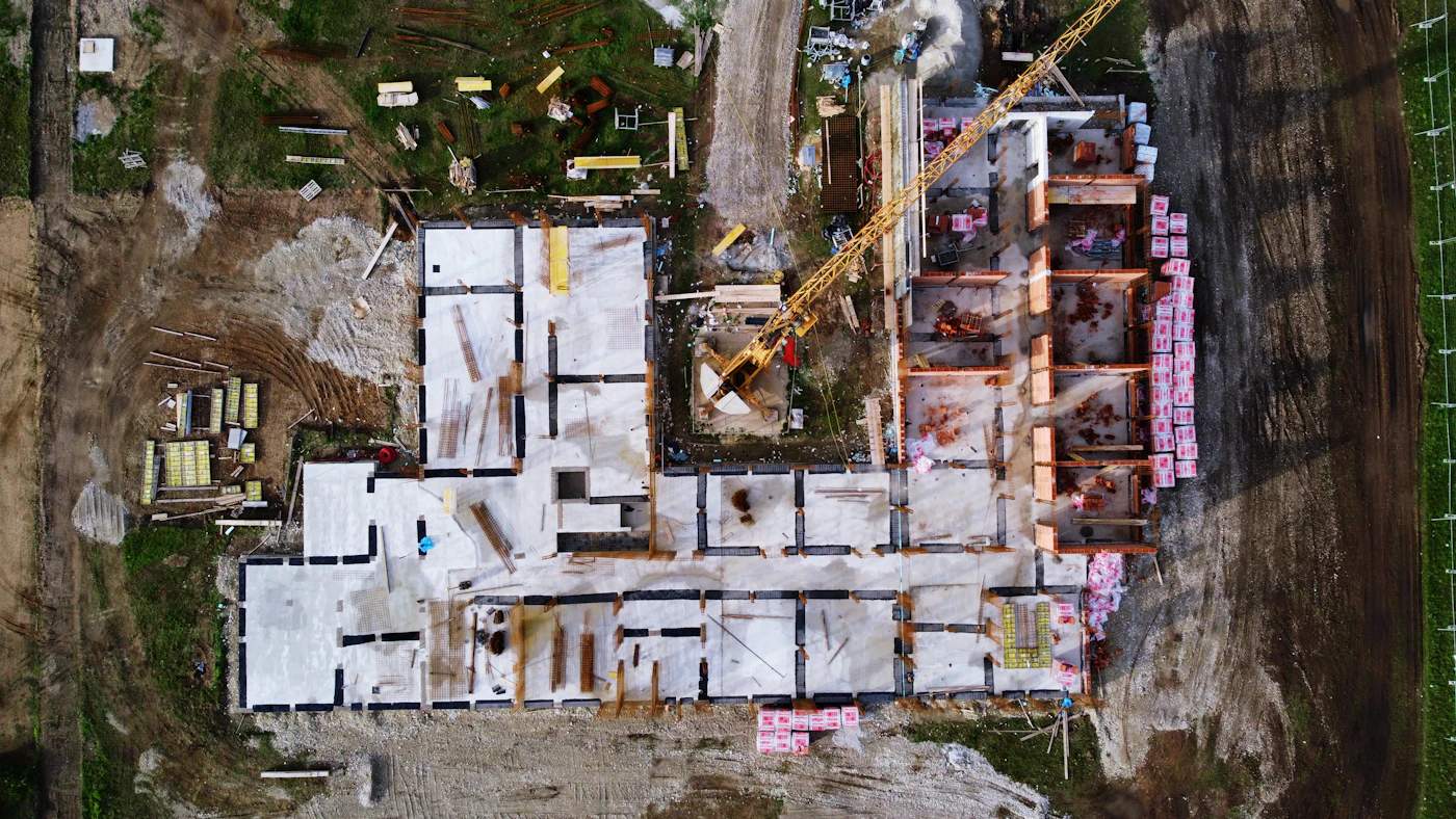 Foundations of a new building photographed straight down from a drone