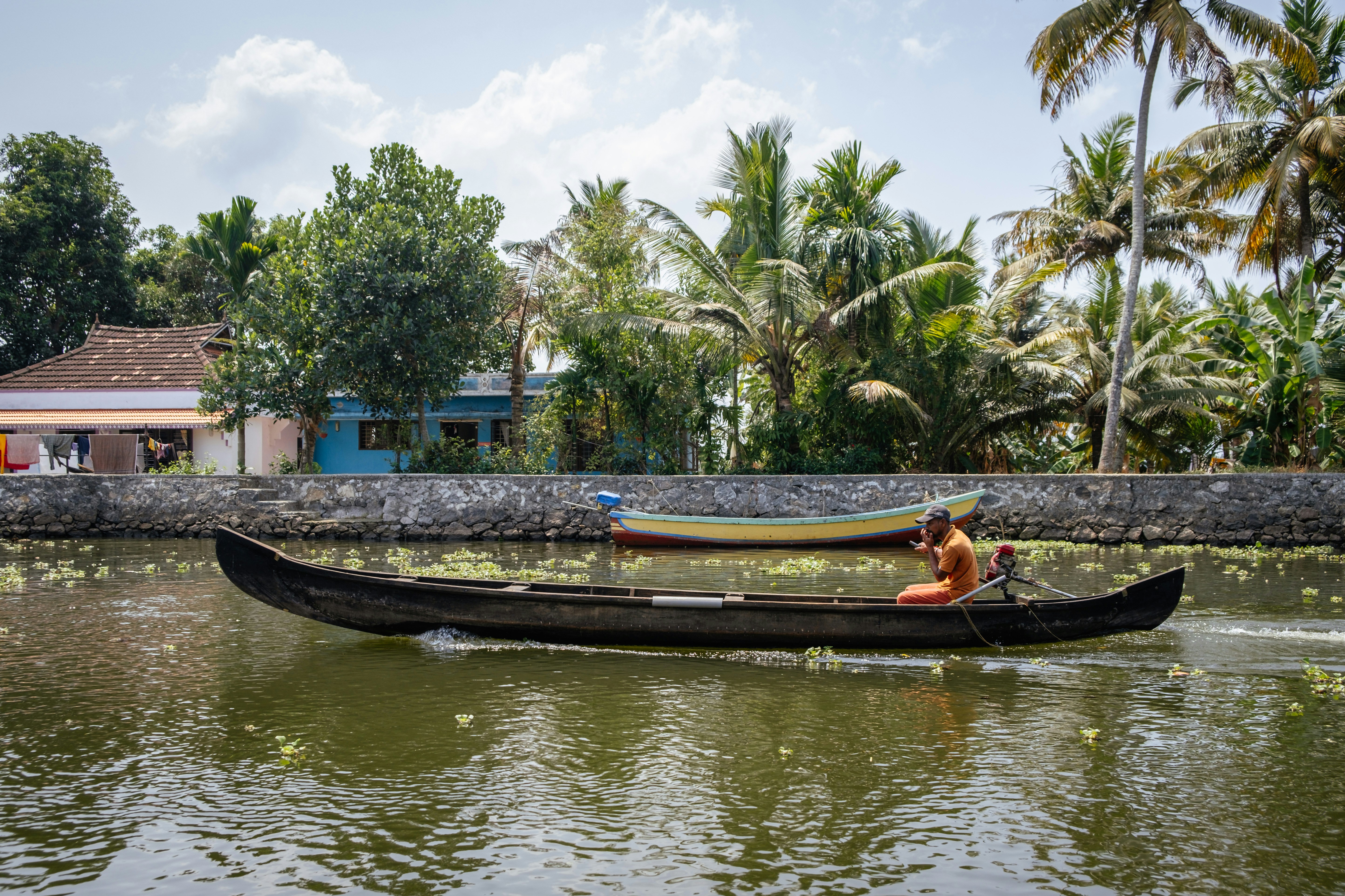 A man in a canoe on a river
