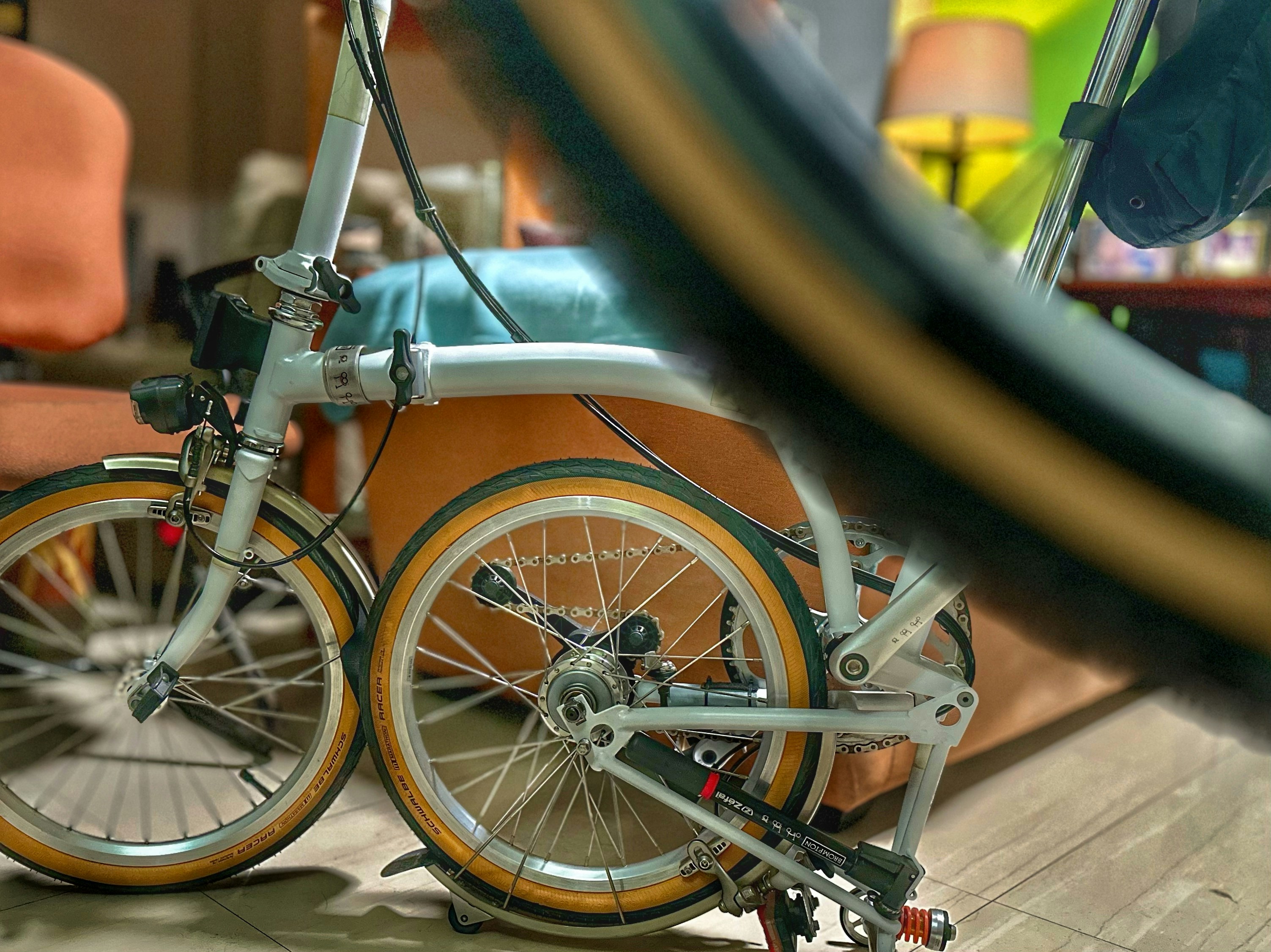 A close up of a bicycle parked in a room