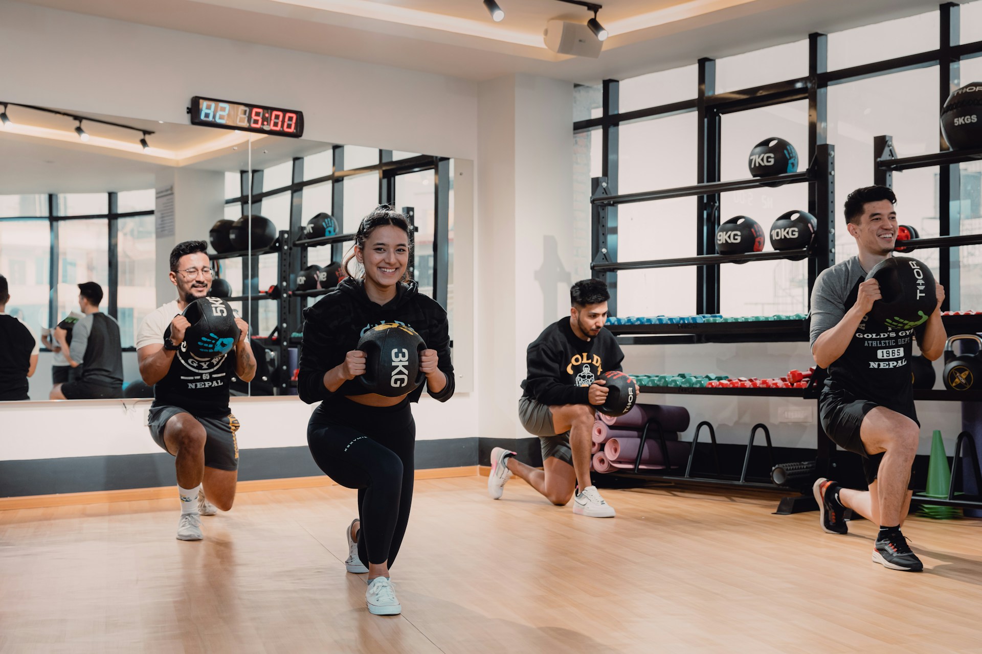 A group of people running in a gym