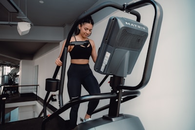 A woman on a treadmill in a gym