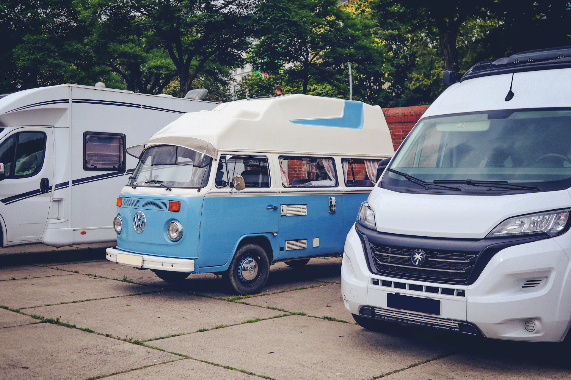 A group of campers parked next to each other