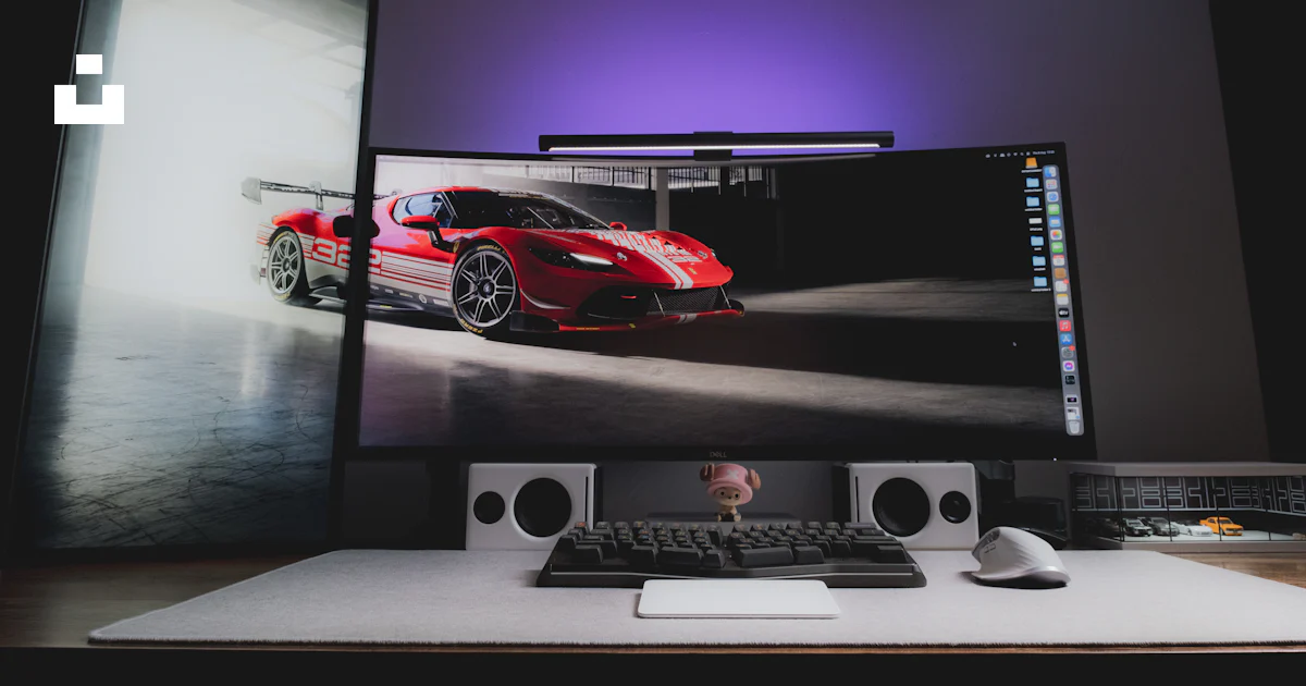 A computer monitor sitting on top of a desk photo – Free Desktop ...