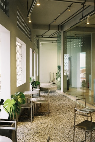 A room filled with lots of chairs and tables