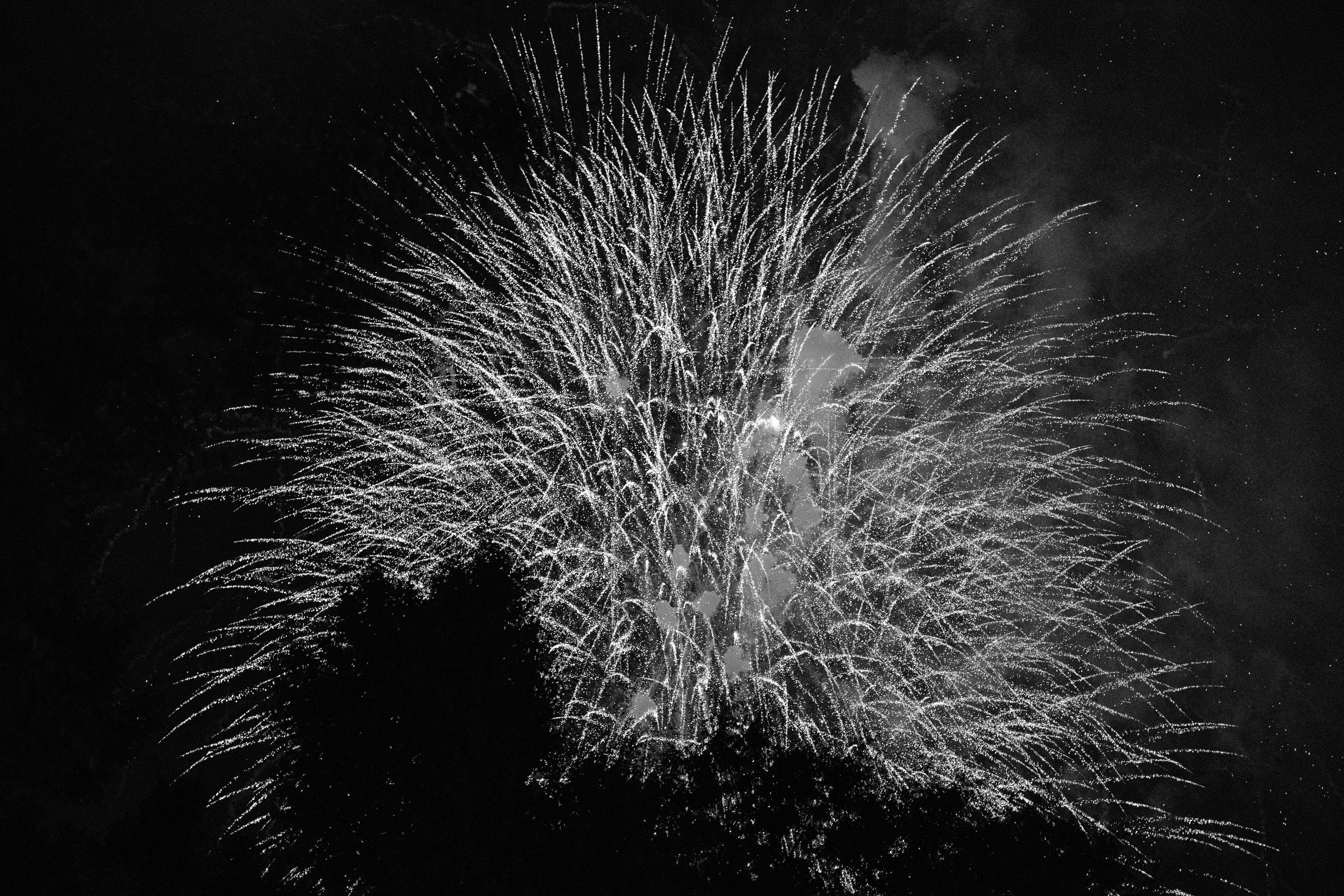 A black and white photo of a fireworks