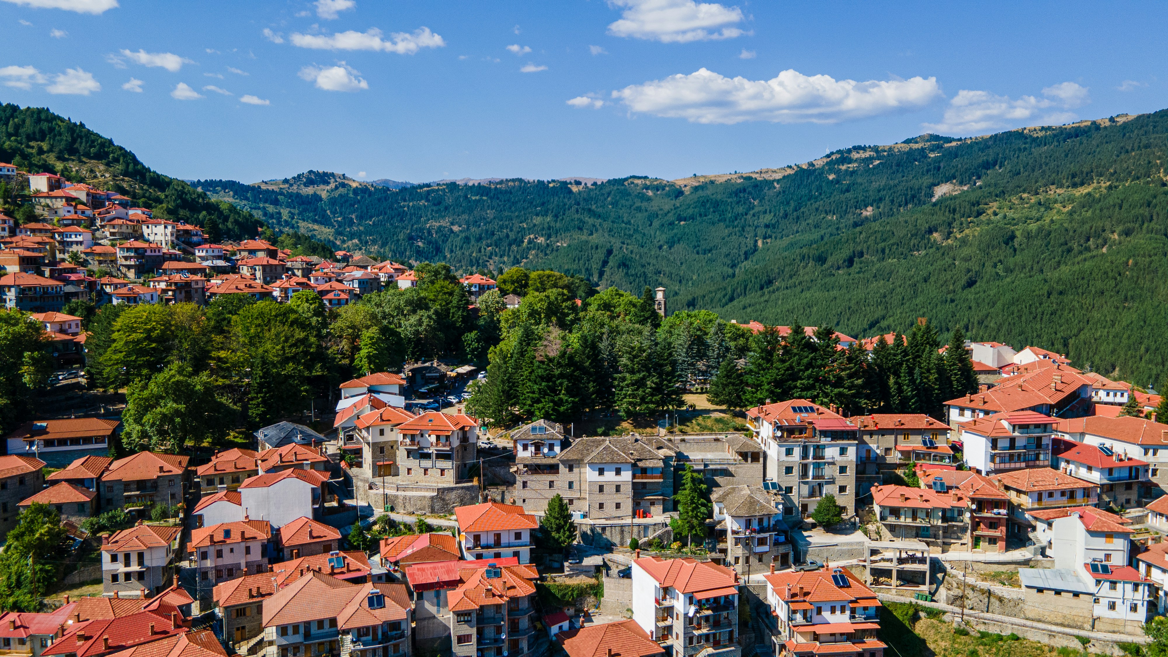 An aerial view of a village in the mountains
