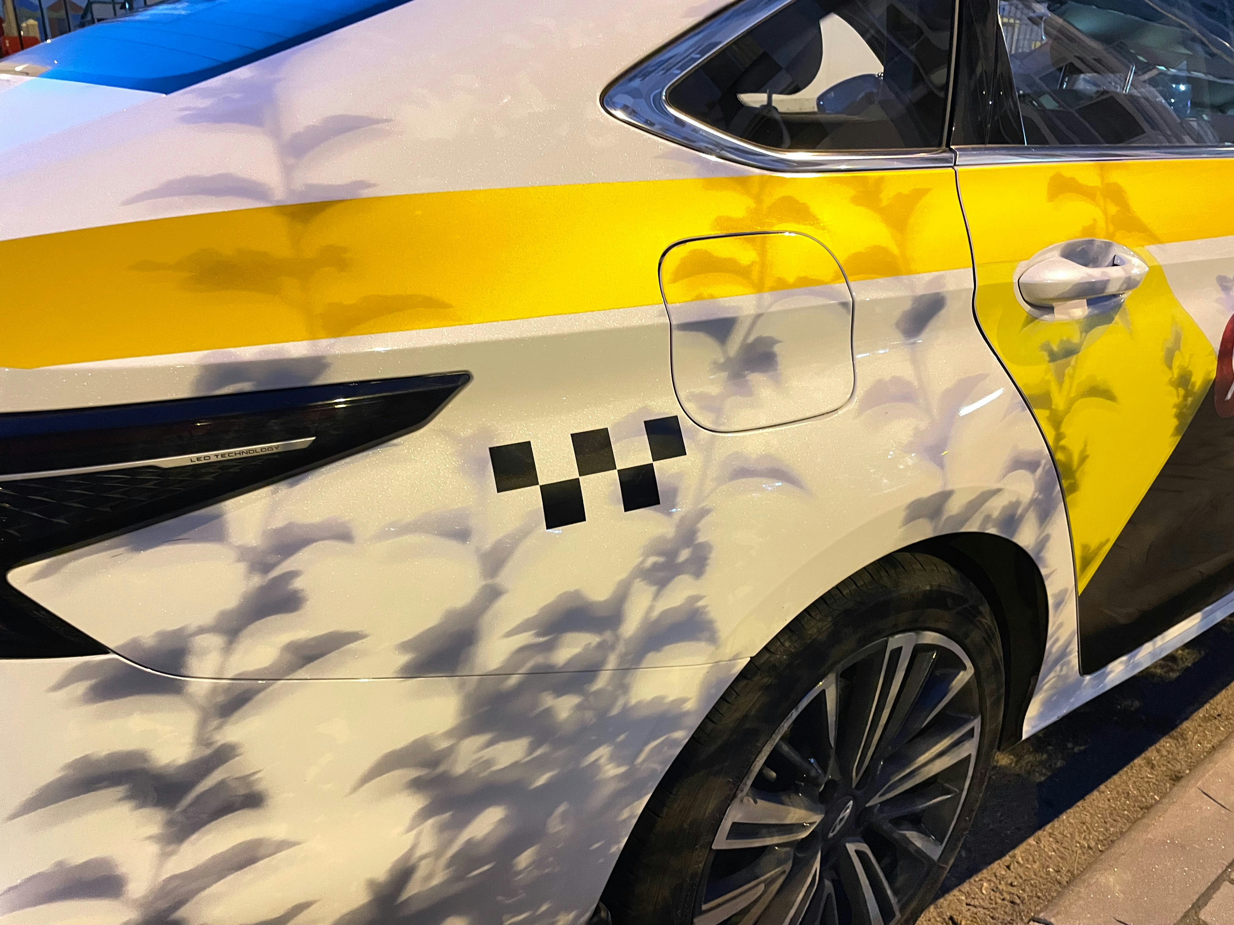 A police car parked on the side of the road