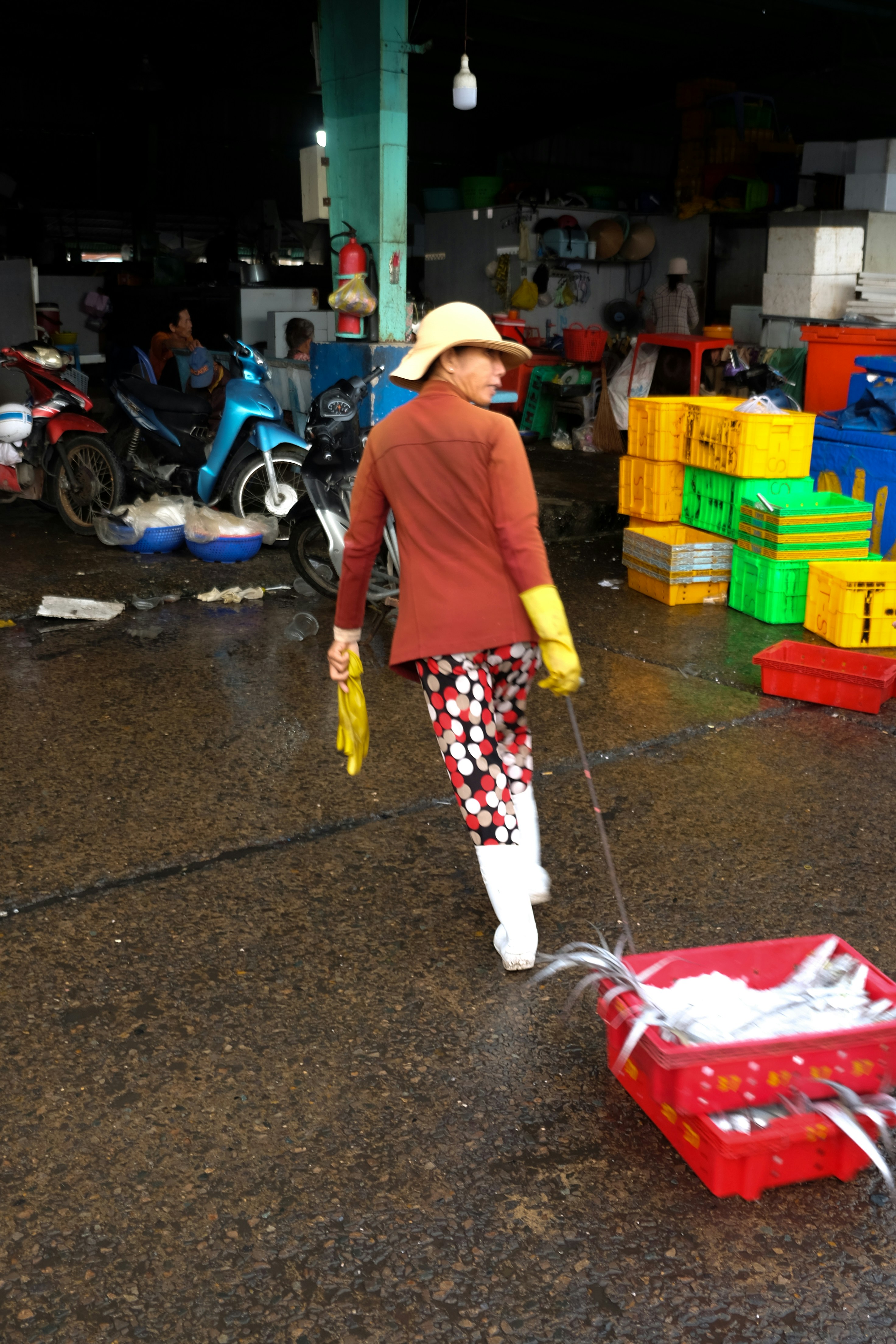 A women moon walking with her basket of fish