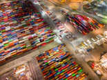 An aerial view of a large amount of shipping containers
