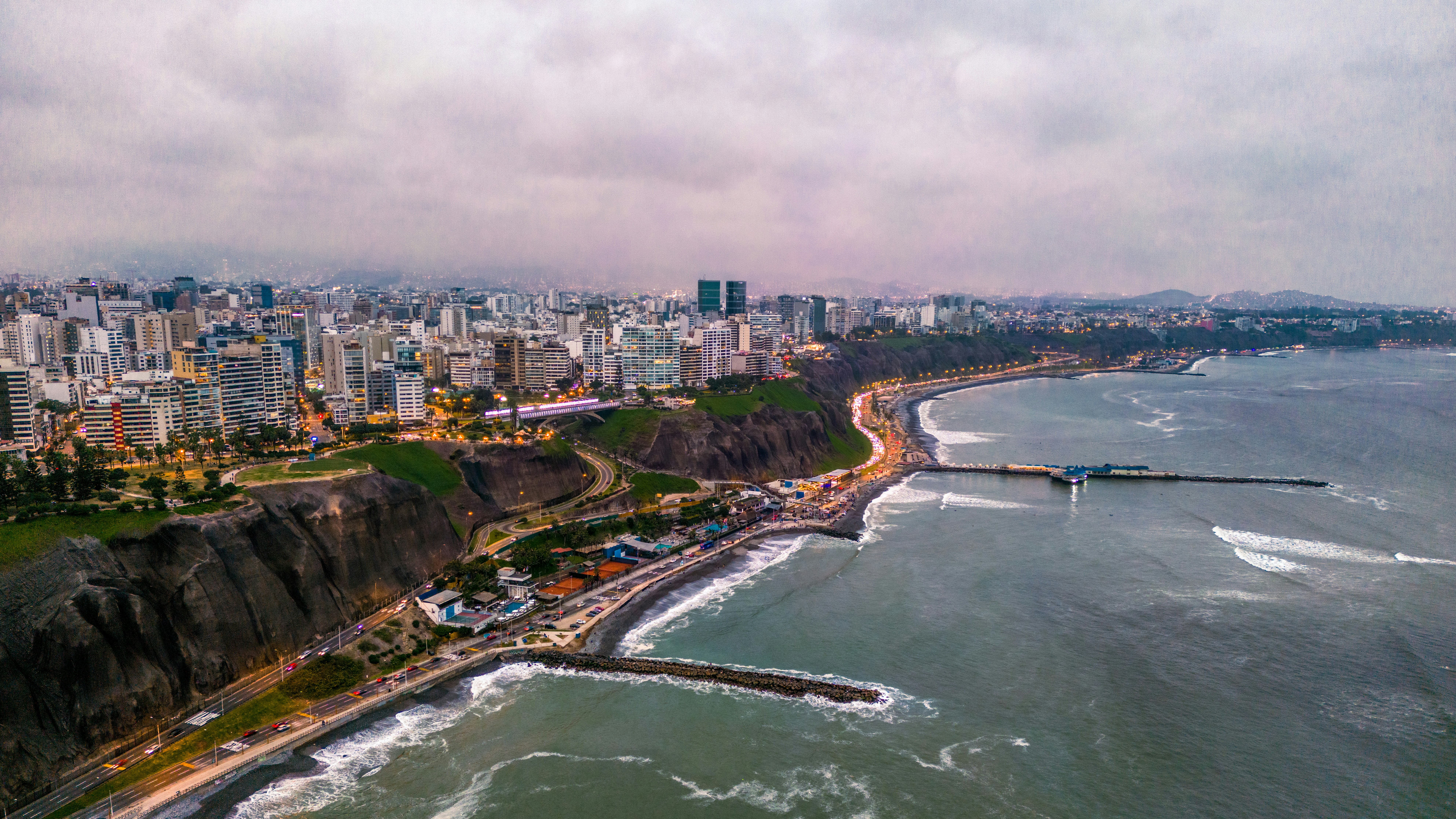 An aerial view of a city and the ocean