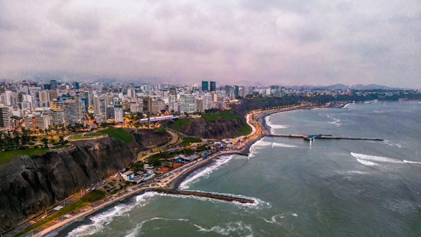 An aerial view of a city and the ocean