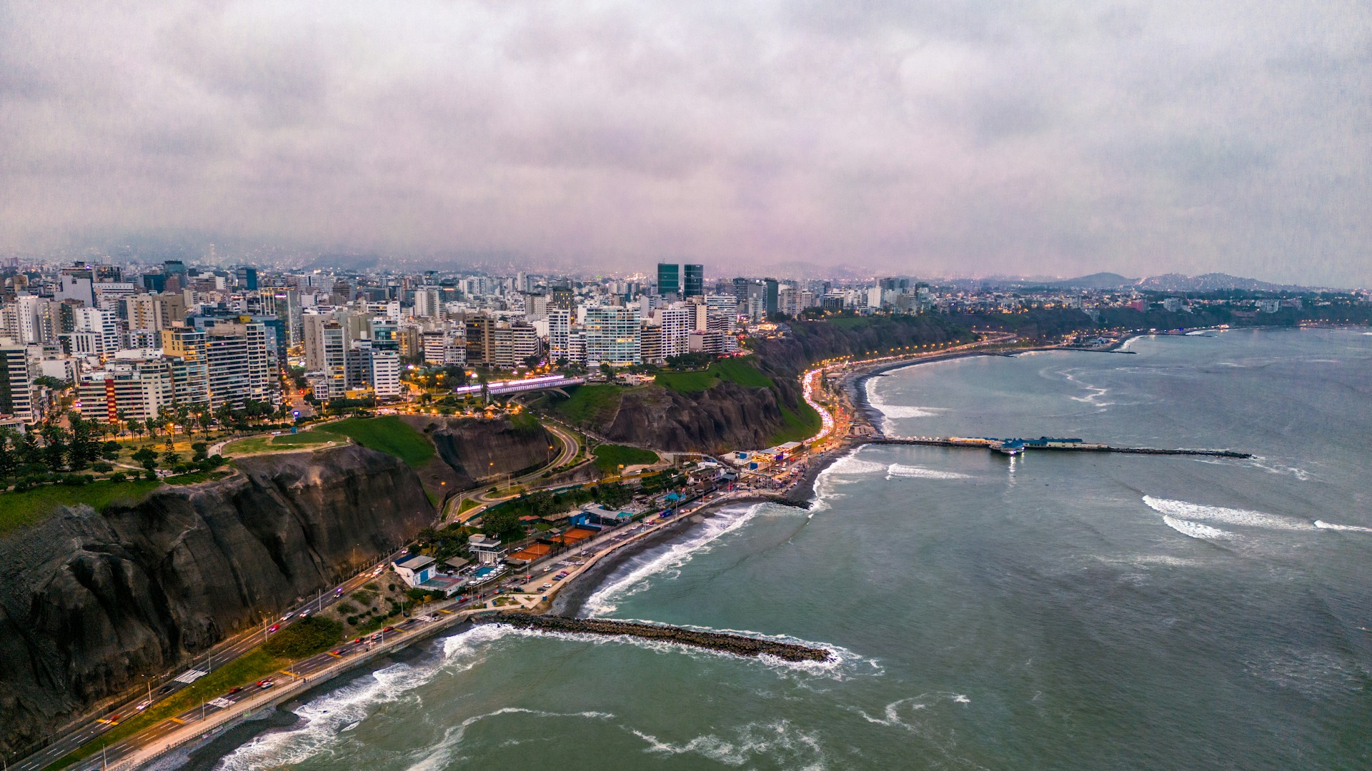 An aerial view of a city and the ocean