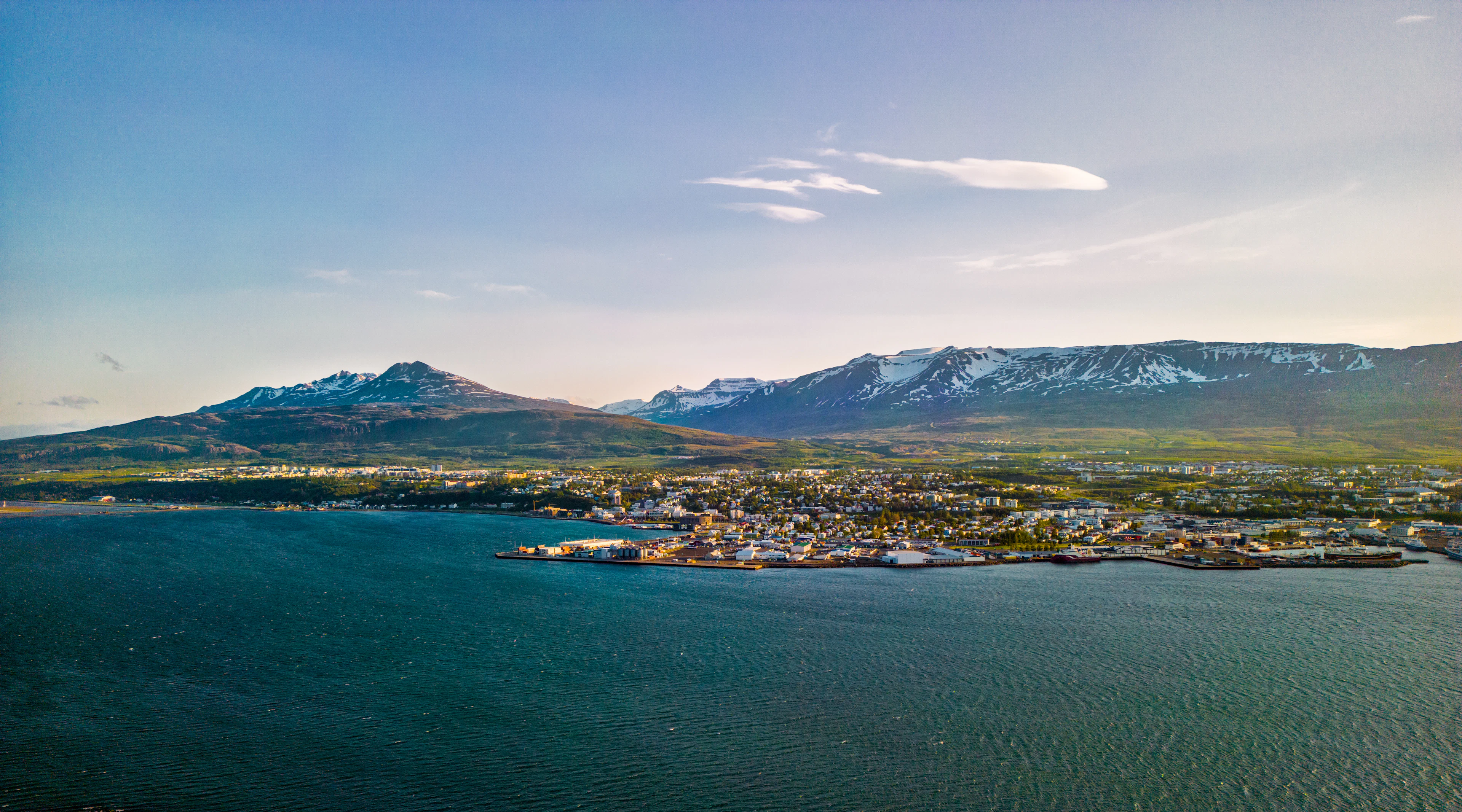 Akureyri at golden hour, seen from across the bay of Eyjafjörður