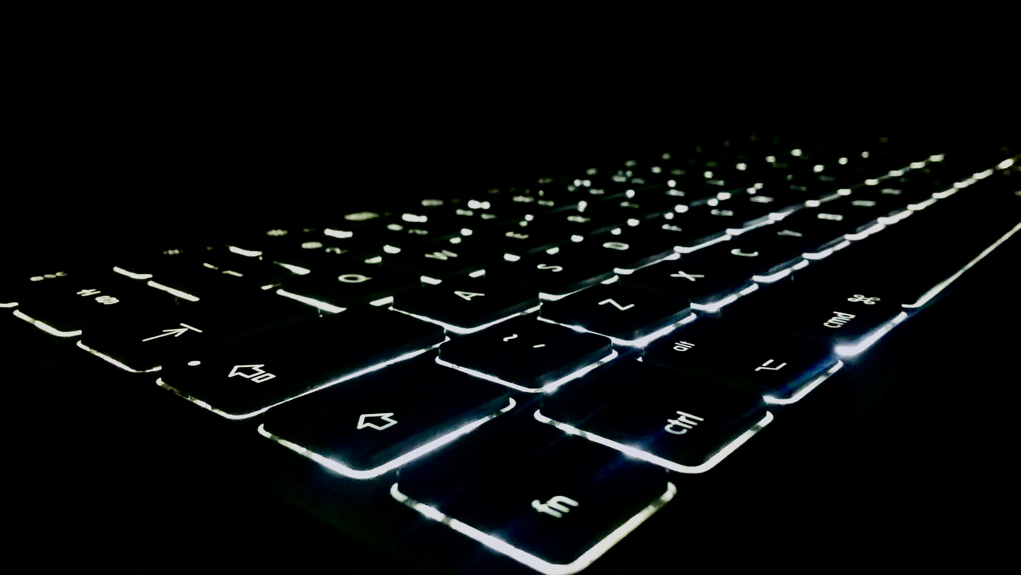 A black and white photo of a computer keyboard
