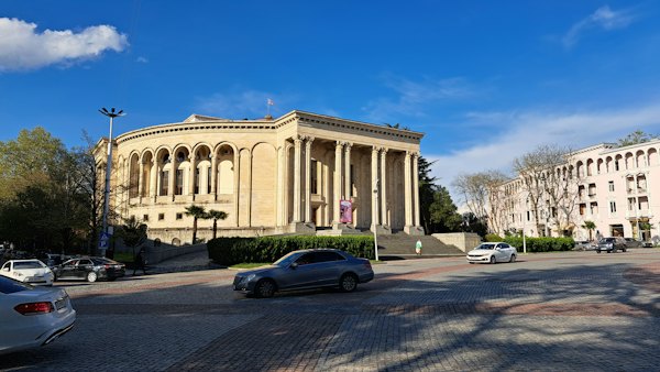 A large building sitting on the side of a road — Kutaisi, Georgia