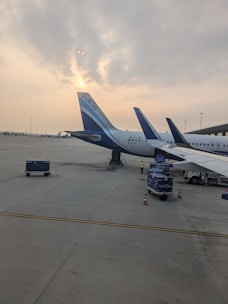 A couple of planes that are on a runway