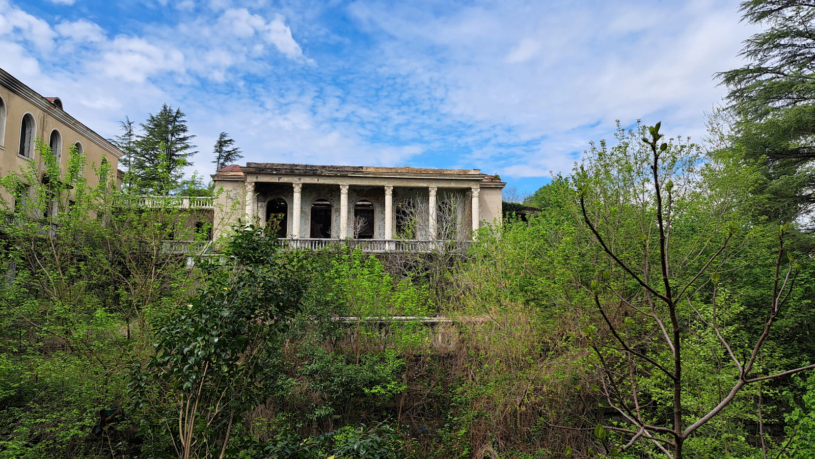 Government building on a green hillside — Pretoria's institutional landscape