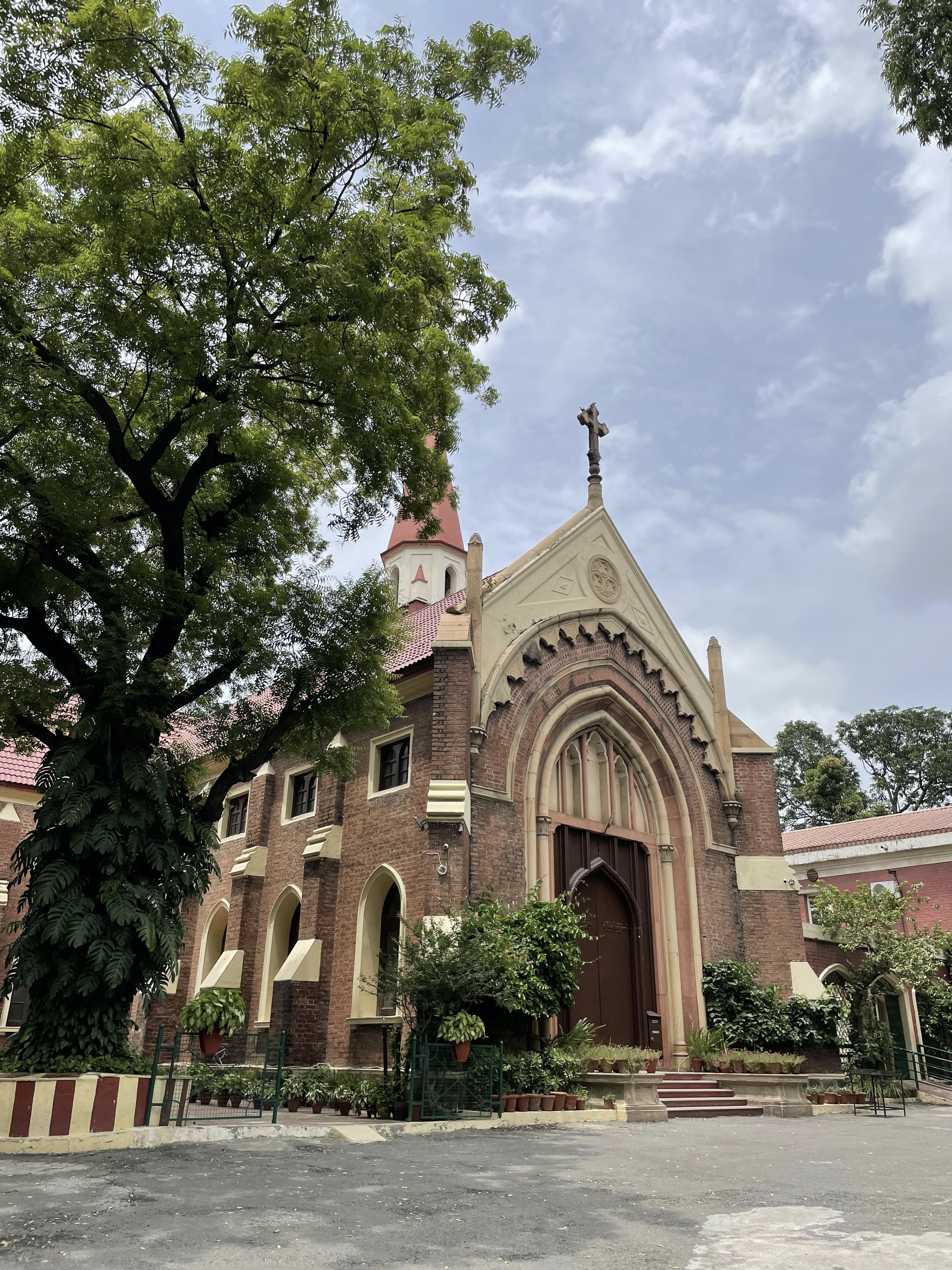 A church with a cross on the top of it