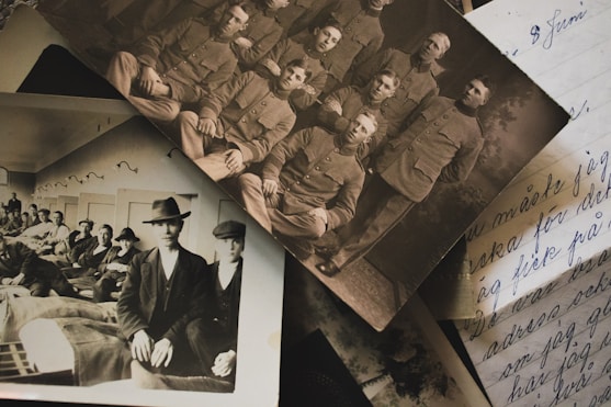 An old photo of a group of people on a table